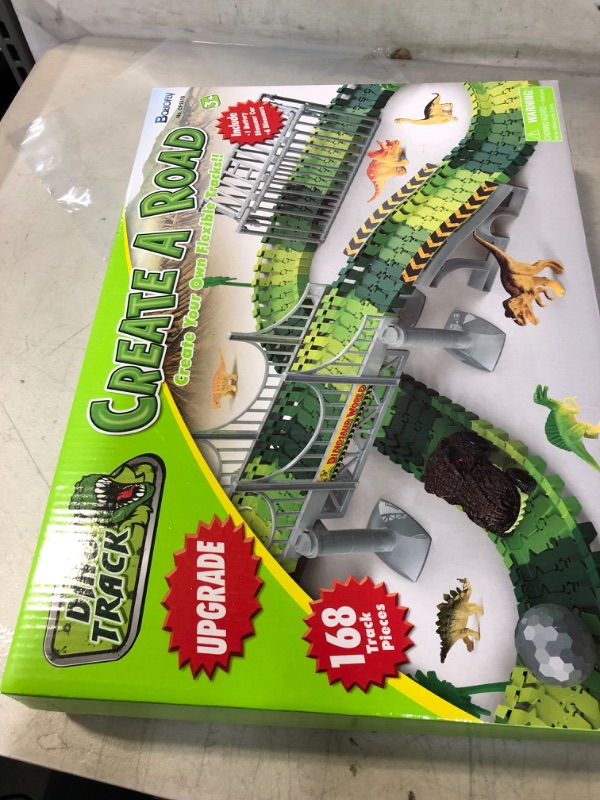 Photo 1 of Batlofty Dinosaur Toys Race Track, Flexible Track Playset, Create A Dinosaur World Road Race with 1 Dinosaur Car and 6 Dinosaur Toys for 3 4 5 6 7 Year Old Boys Girls Birthday Gifts Dinosaur Race Track