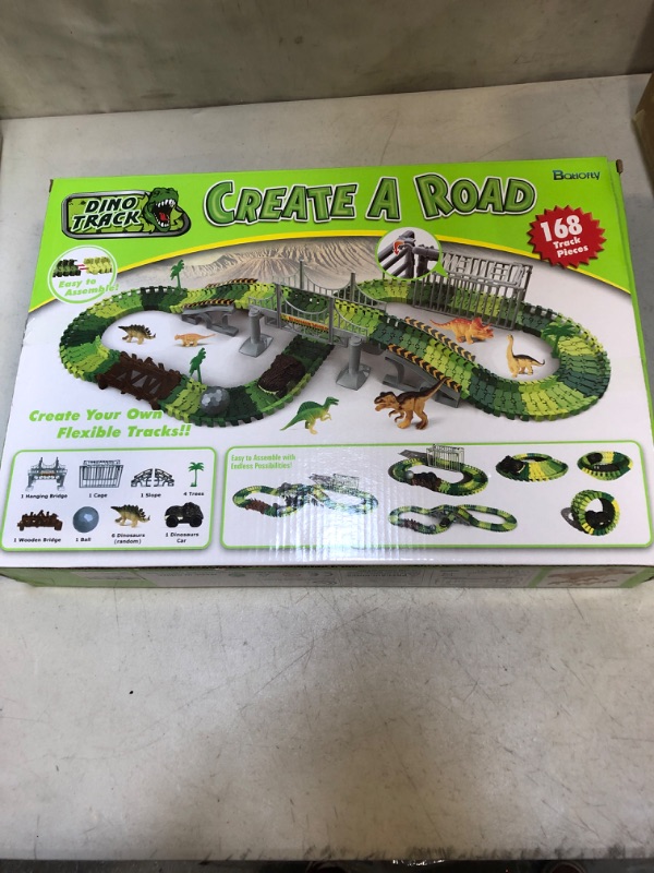 Photo 4 of Batlofty Dinosaur Toys Race Track, Flexible Track Playset, Create A Dinosaur World Road Race with 1 Dinosaur Car and 6 Dinosaur Toys for 3 4 5 6 7 Year Old Boys Girls Birthday Gifts  -- FACTORY SEALED --
