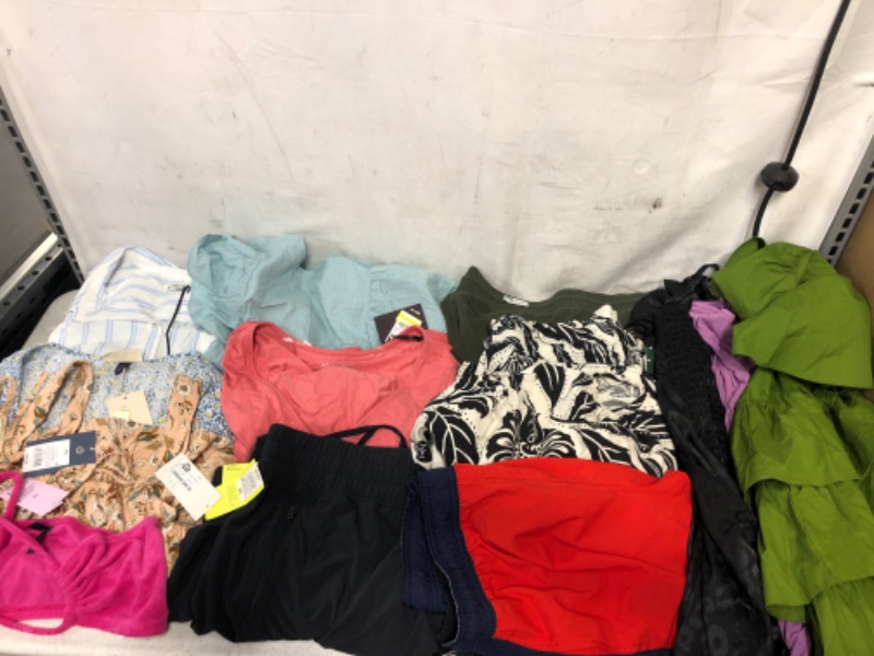 Photo 1 of Assorted Women New and Used Clothes Various Sizes Sold as Is