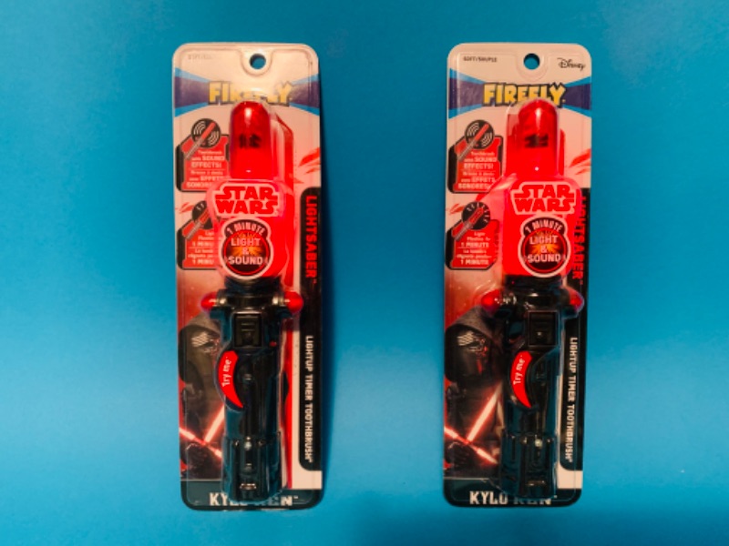 Photo 1 of 635203… 2 Disney Star Wars lightsaber toothbrushes with light,  sound, and timer