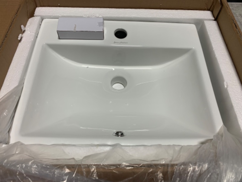 Photo 2 of 635437…returned never installed Swiss Madison 18” rectangle wall mount bathroom sink