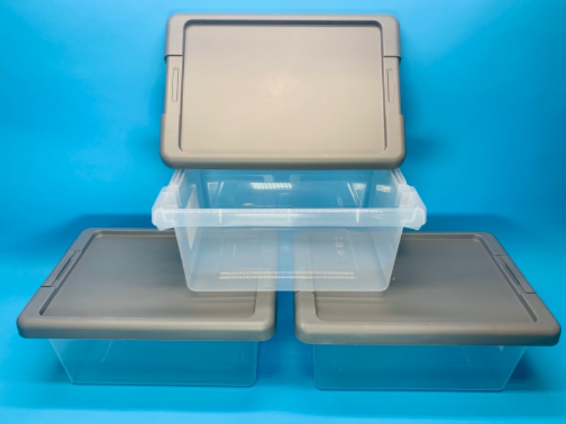 Photo 1 of 635450… 3 small stackable latching storage bins with lids 