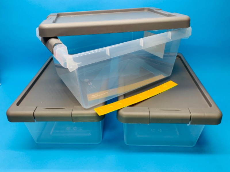 Photo 1 of 635450… 3 small stackable latching storage bins with lids 