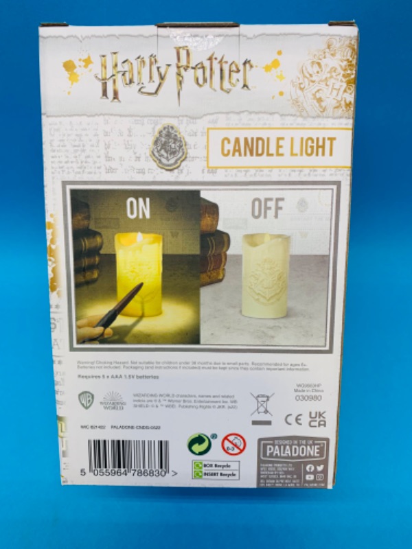 Photo 2 of 636428…Harry Potter candle light-wand turns it  on and off 