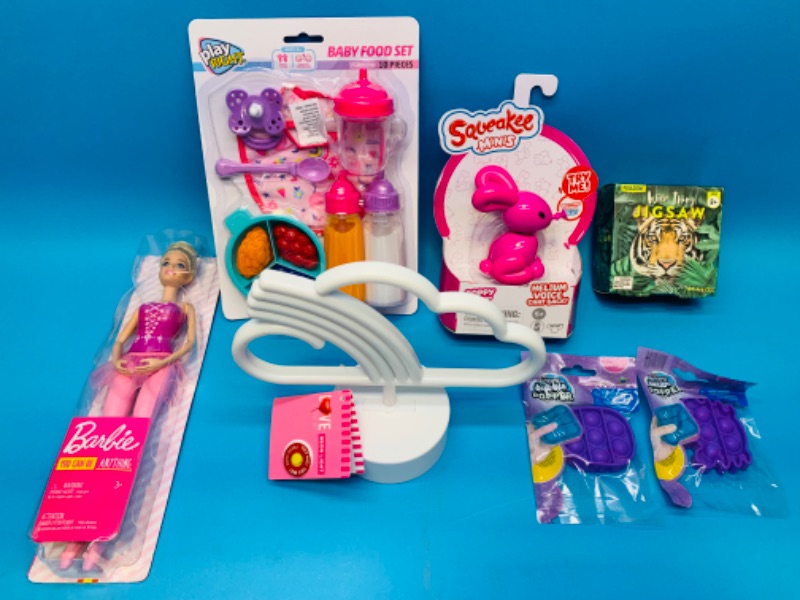 Photo 1 of 636720…Barbie, Helium voice chat back bunny, fidgets and more