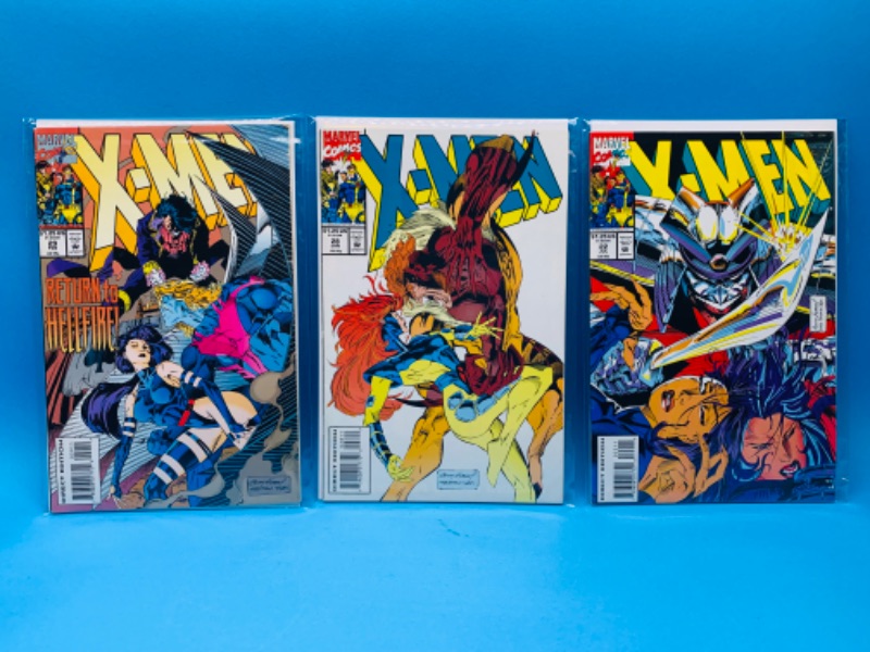 Photo 1 of 636753…3 older X-men comics in plastic sleeves 