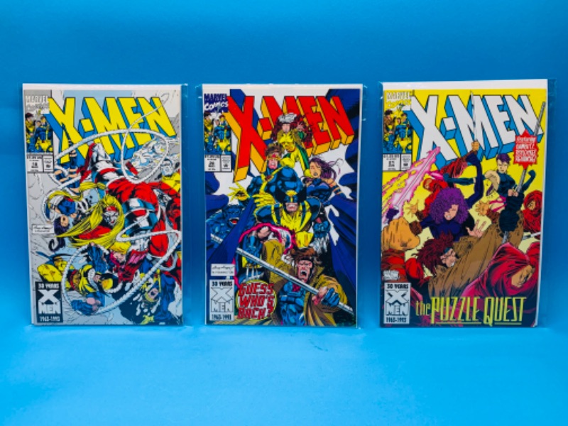 Photo 1 of 636754…3 older X-men comics in plastic sleeves 