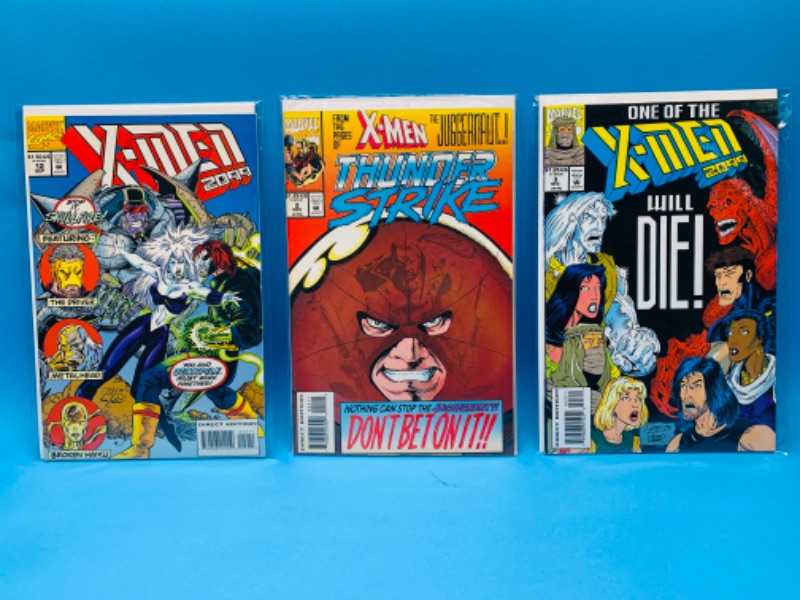 Photo 1 of 636756…3 older X-men comics in plastic sleeves 