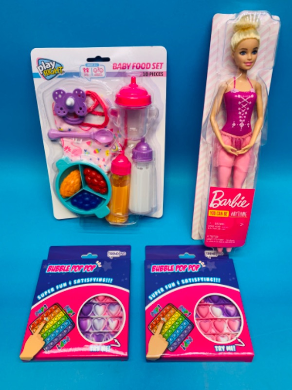 Photo 1 of 636800…Barbie doll, fidgets, and food toy