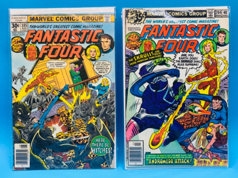 Photo 1 of 637114…2 vintage fantastic four  comics in plastic sleeves - some stains and wear