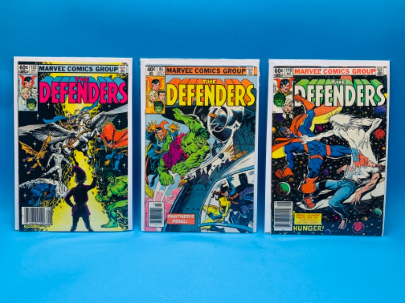 Photo 1 of 637116…3 vintage $.40 and $.60 defenders  comics in plastic sleeves 