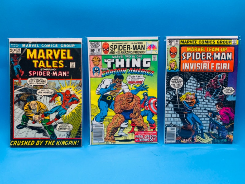 Photo 1 of 637119…vintage Spider-Man  comics in plastic sleeves 