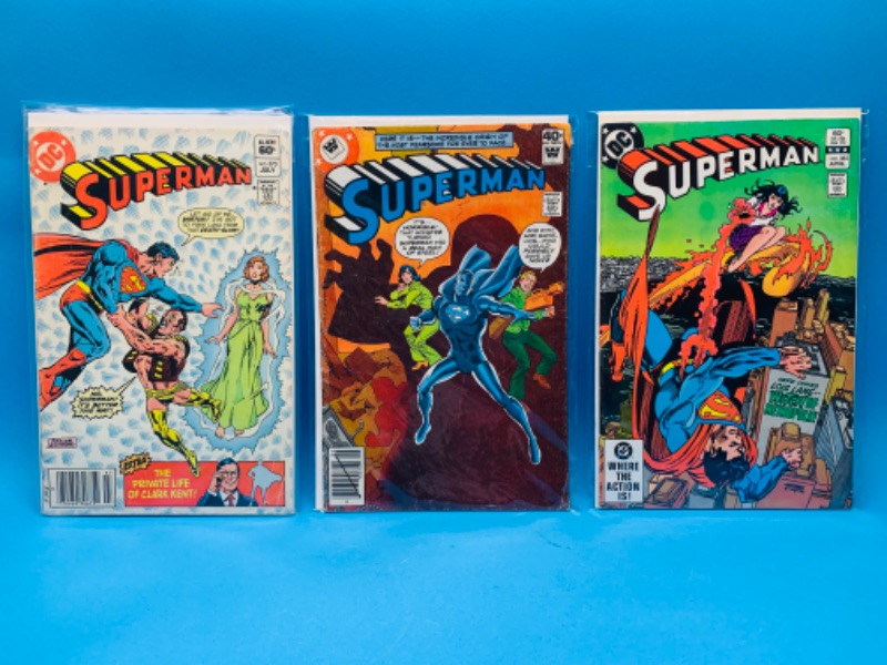 Photo 1 of 637123…3 vintage Superman  comics in plastic sleeves - some wear from age