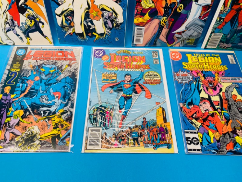 Photo 2 of 637155…7 vintage legion of superheroes comics in plastic sleeves 