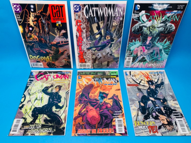 Photo 1 of 637254…6 catwoman comics in plastic sleeves 
