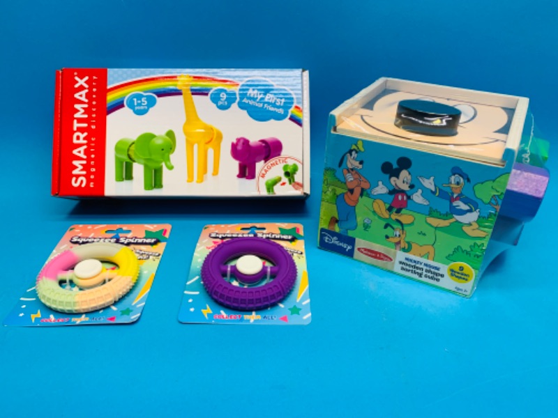 Photo 1 of 637333… Disney wooden shape cube, magnetic animals, and fidget toys