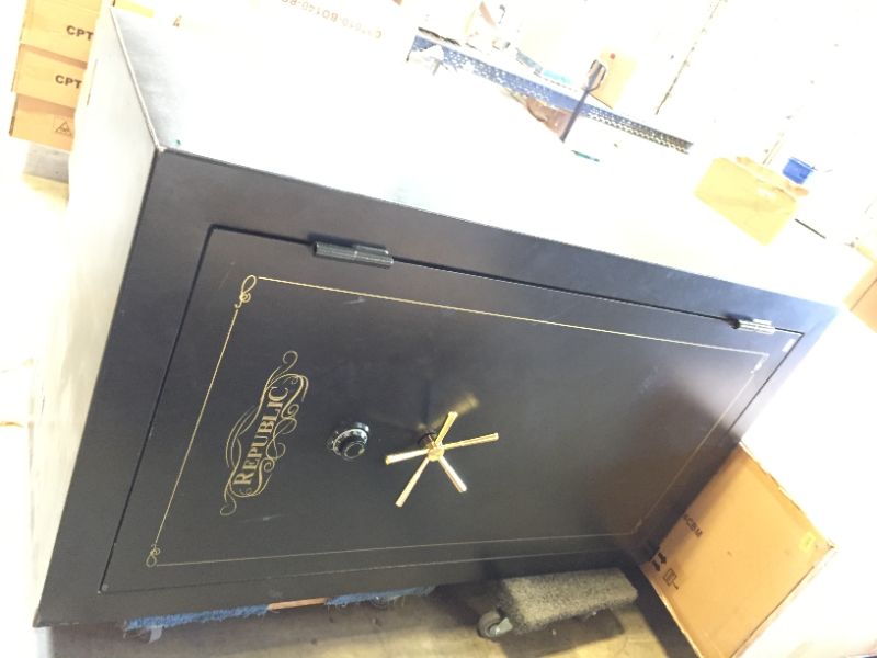 Photo 2 of 27 x 42 x 72 inch republic safe - combination safe.needs new setting screw.