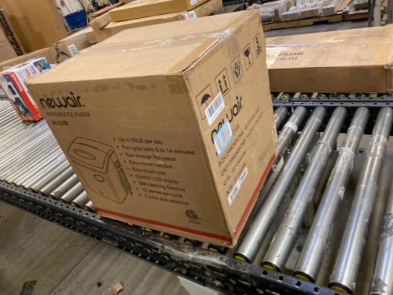 Photo 1 of FOR PARTS - NOT FUNCTIONAL - Portable Ice Maker 50 lb. Daily | Red | 3 Size Bullet Shaped Ice | *WET FROM PRIOR USE*  | Self Cleaning Quiet Operation Countertop Ice Machine | AI-215R
