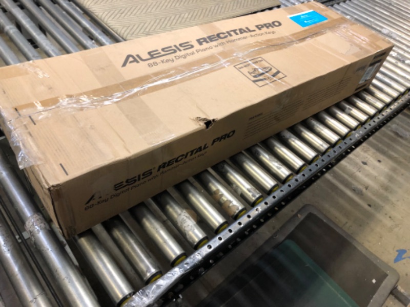 Photo 1 of Alesis Recital Pro - 88 Key Digital Piano Keyboard with Hammer Action Weighted Keys, 2x20W Speakers, 12 Voices, Record and Lesson Mode, FX and Display - MISSING MUSIC NOTE STAND -