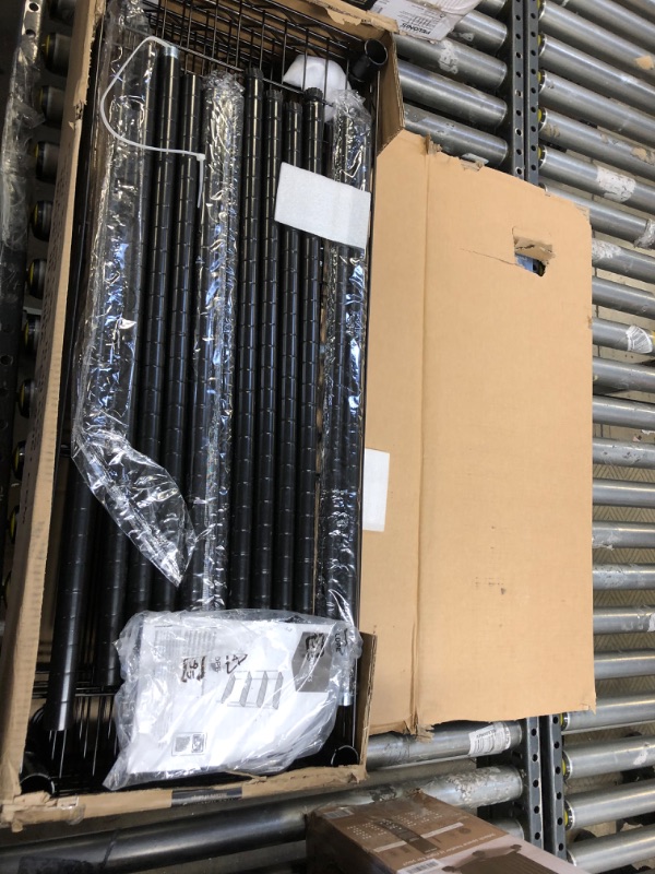 Photo 2 of Amazon Basics 4-Shelf Adjustable, Heavy Duty Storage Shelving Unit (350 lbs loading capacity per shelf), Steel Organizer Wire Rack, Black (36L x 14W x 54H) - LOOSE HARDWARE.
