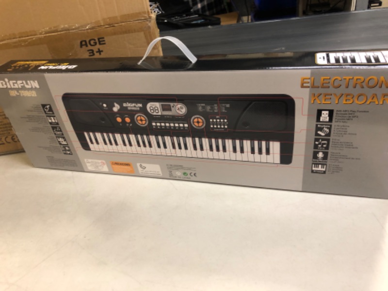 Photo 1 of BIGFUN Keyboard Piano for Kids, 61Key Multifunction Electric Piano Keyboard Educational Instrument Toy for 3 4 5 6 7 8 9 10 11 12 Years Old Boys and Girls with Microphone (Black)…---factory sealed