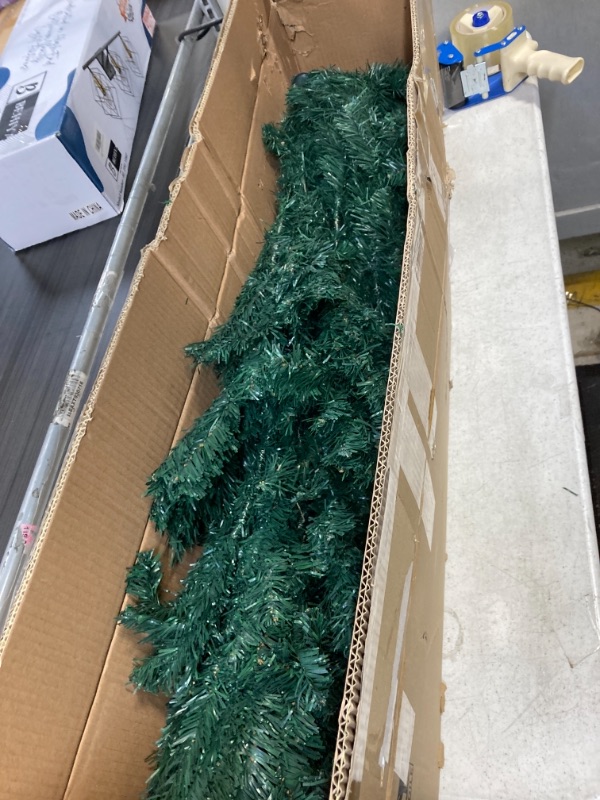 Photo 1 of Artificial Holiday Christmas Tree, 7.5 ft Premium Spruce Xmas Pine Tree with 1100 Full Tips, Easy Assembly, Foldable Metal Stand, Storage Bag, for Home Office Party Decoration, Green