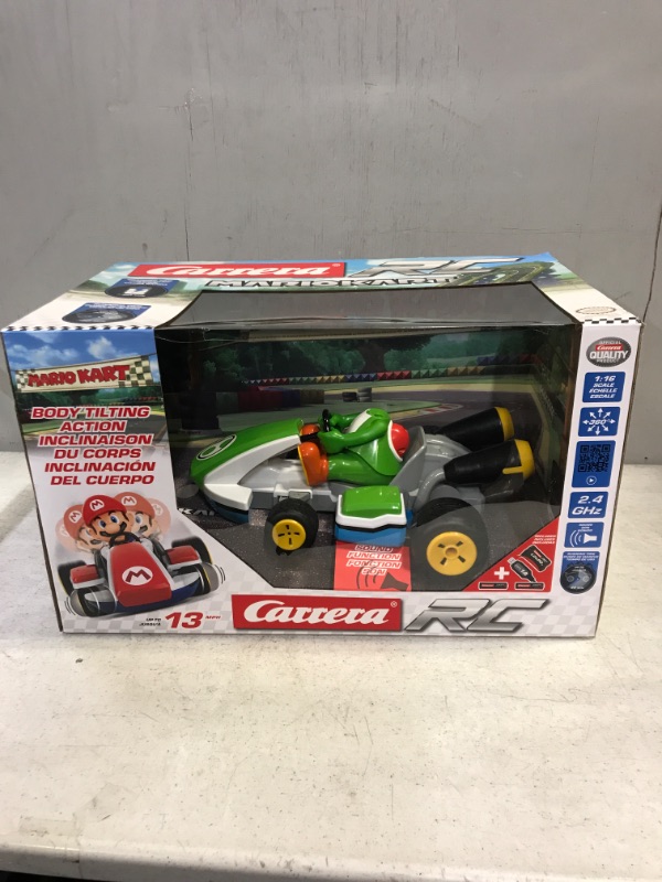 Photo 2 of Carrera RC 370162108X Official Licensed Mario Kart Yoshi Race Kart 1:16 Scale 2.4 GHz Splash Proof Remote Control Car Vehicle with Sound and Body Tilting Action - Rechargeable Battery - Kid Toys Mario Kart Race Kart - Yoshi