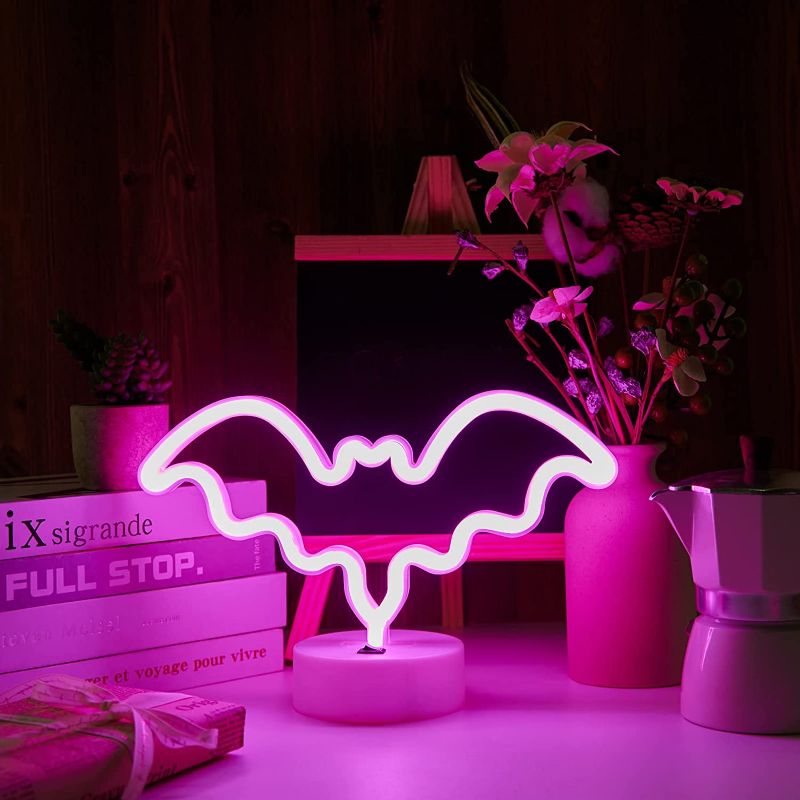 Photo 1 of Table Neon Lights for Bedroom Indoor, Pink Neon Signs Home Decor Table Lamp for Room Bedroom Living Room Birthday Part, Christmas Pink LED Festival Pink Bat Neon Lights
