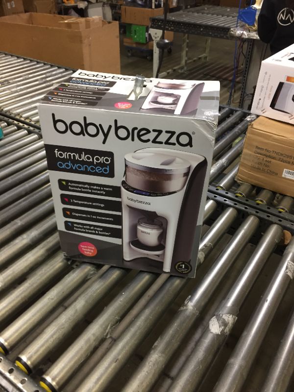 Photo 1 of New and Improved Baby Brezza Formula Pro Advanced Formula Dispenser Machine - Automatically Mix a Warm Formula Bottle Instantly - Easily Make Bottle with Automatic Powder Blending
