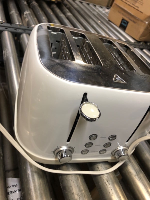 Photo 1 of Amazon Basics 4-Slot Toaster, Brushed Silver
