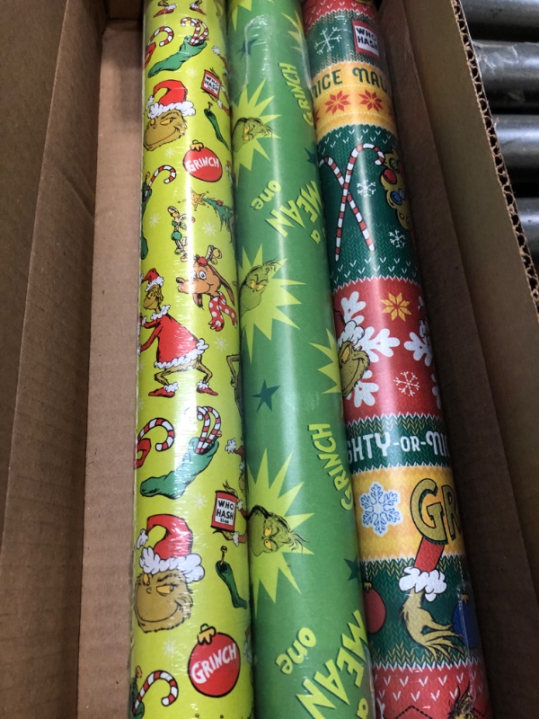 Photo 2 of American Greetings Christmas Wrapping Paper with Cut Lines Bundle, The Grinch (3 Rolls, 105 sq. ft.)