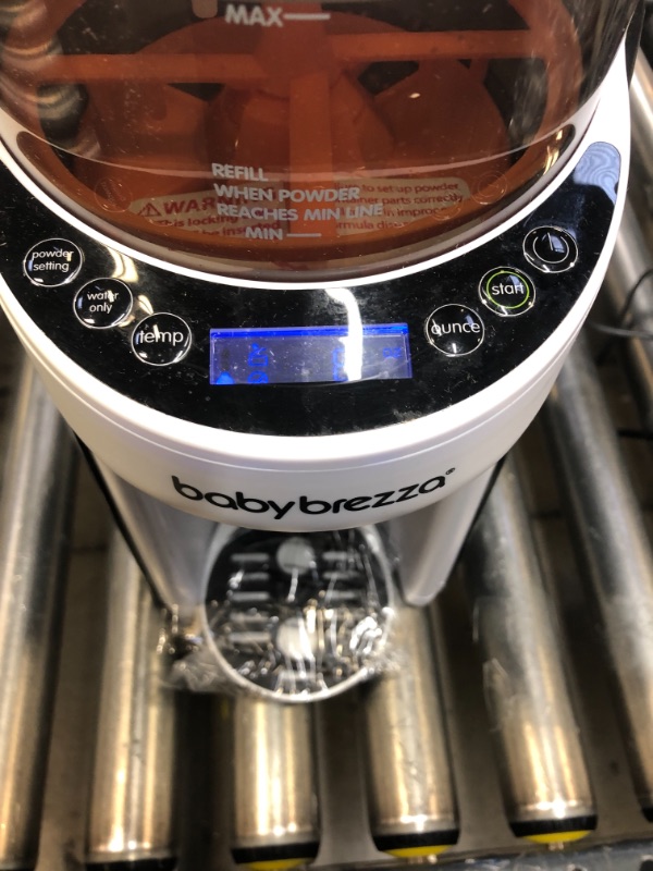 Photo 1 of New and Improved Baby Brezza Formula Pro Advanced Formula Dispenser Machine - Automatically Mix a Warm Formula Bottle Instantly - Easily Make Bottle with Automatic Powder Blending