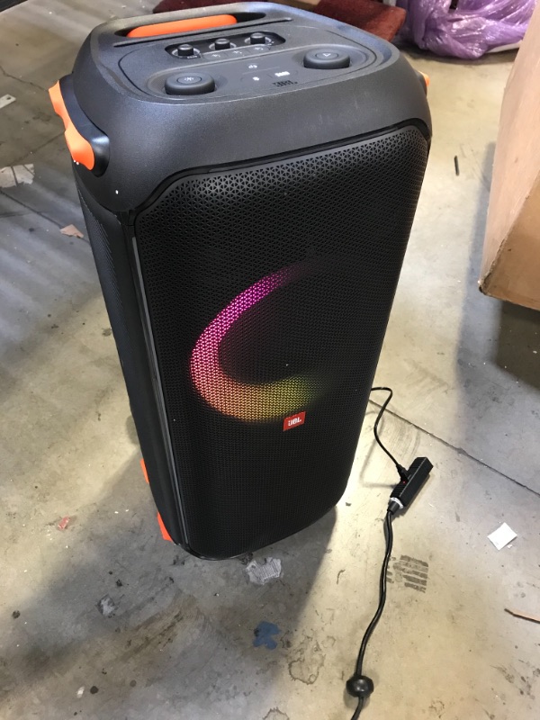 Photo 2 of JBL PartyBox 710 -Party Speaker with Powerful Sound, Built-in Lights and Extra Deep Bass, IPX4 Splash Proof, App/Bluetooth Connectivity, Made for Everywhere with a Handle and Built-in Wheels (Black)
