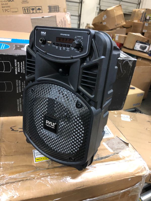 Photo 2 of Pyle Portable Bluetooth PA Speaker System-300W Rechargeable Indoor/Outdoor Bluetooth Speaker Portable System w/ 8” Subwoofer 1” Tweeter, Microphone in, Party Lights, MP3/USB, Radio, Remote PPHP834B