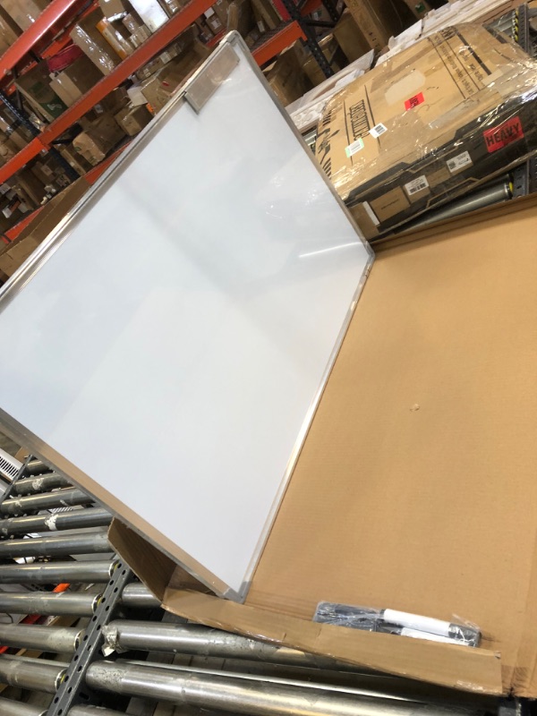 Photo 1 of 36x24 inch whiteboard - slightly bent