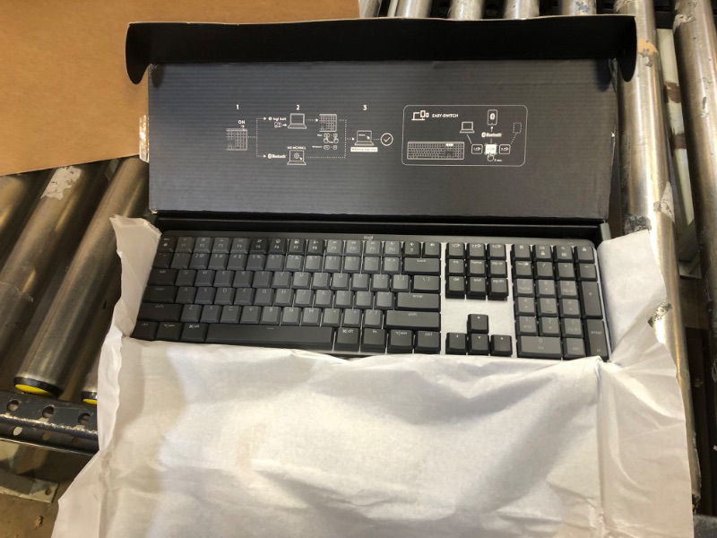 Photo 2 of Logitech MX Mechanical Wireless Illuminated Performance Keyboard, Tactile Quiet Switches, Backlit Keys, Bluetooth, USB-C, macOS, Windows, Linux, iOS, Android, Metal Full Size Tactile (quiet typing) Keyboard
