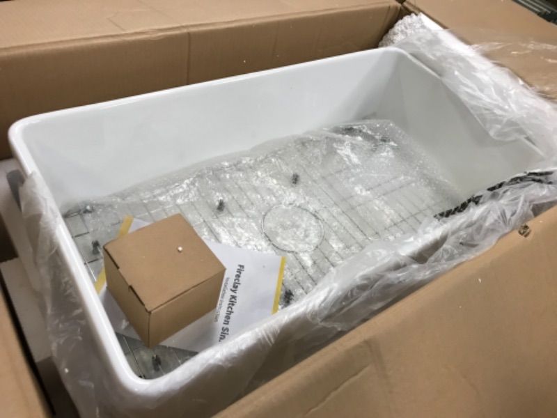Photo 1 of White Fireclay 33 in. Single Bowl Farmhouse Apron Kitchen Sink with Grid and Strainer
