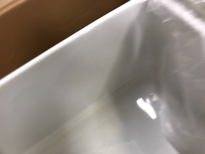Photo 1 of White Fireclay 33 in. Single Bowl Farmhouse Apron Kitchen Sink with Grid and Strainer

