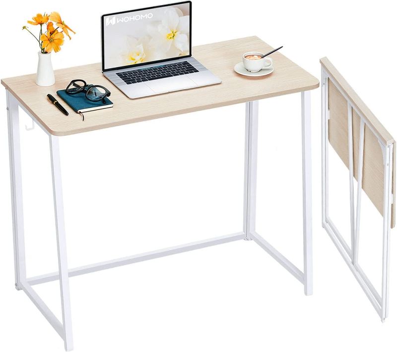 Photo 1 of WOHOMO Folding Desk, Small Foldable Desk " for Small Spaces, Space Saving Computer Table Writing Workstation for Home Office, Easy Assembly, Oak, HARDWARE BAG OPENED, UNKNOWN IF MISSING PCS 
