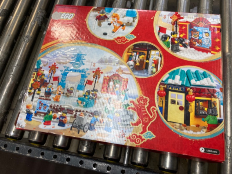 Photo 3 of LEGO Lunar New Year Ice Festival 80109 Building Kit; Gift Toy for Kids Aged 8 and Up; Building Set Featuring a Detailed Winter Scene, Chun Ice Sculpture, 13 Minifigures and More (1,519 Pieces) Frustration-Free Packaging