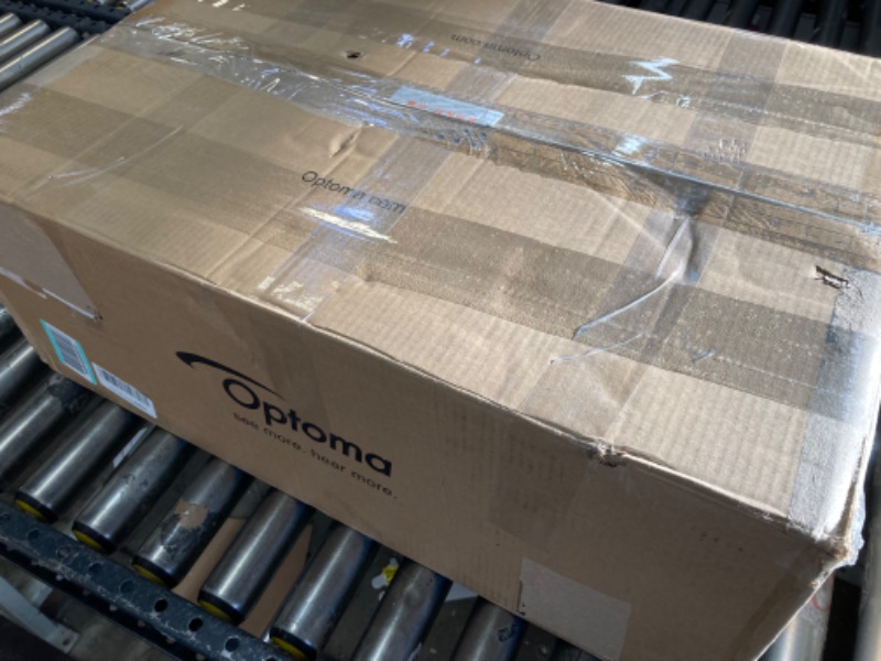 Photo 1 of Optoma CinemaX P2B Black Smart 4K UHD Laser Projector for Home Theater | 3000 Lumens Superior Image with Laser & 6-Segment Color Wheel | Ultra-Short Throw | Built-In Soundbar | Works w/ Alexa & Google
