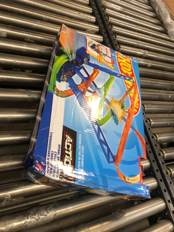 Photo 3 of ?Hot Wheels Track Set and 1:64 Scale Toy Car, 29" Tall Track with Motorized Booster for Fast Racing, Action Spiral Speed Crash Playset???? - missing car