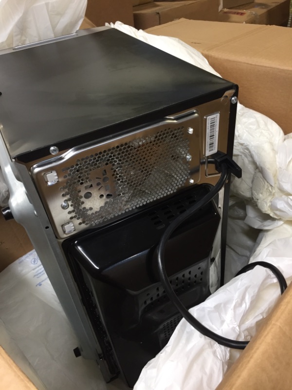 Photo 4 of 1.2 cu. ft. Countertop ToastWave 4-in-1 Convection Oven, Air Fry, Toaster Oven, Microwave in Stainless Steel----------item is missing some parts and has minor damage to the back and needs cleaning 