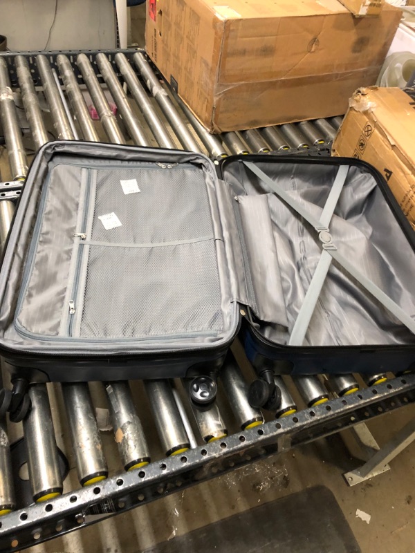 Photo 1 of AmazonBasics Hardside Spinner Luggage, Navy Blue - 24 inch