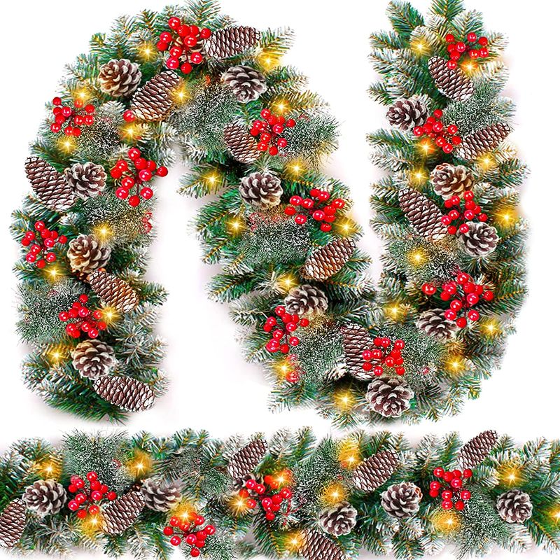Photo 1 of [ 2 Pack & Timer 8 Mode ] Prelit Christmas Garland Decoration, Each 9 Ft 100 LED Thick 300 Tips Snowy Bristle Pine 198 Red Berry 18 Pine Cones Battery Operated Mantle Xmas Decor, Total 18 Ft 200 LED
