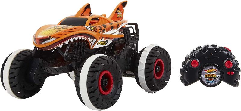 Photo 1 of Hot Wheels Monster Trucks, Remote Control Car, Monster Truck Toy with All-Terrain Wheels, 1:15 Scale Unstoppable Tiger Shark RC ( USED ITEM )
