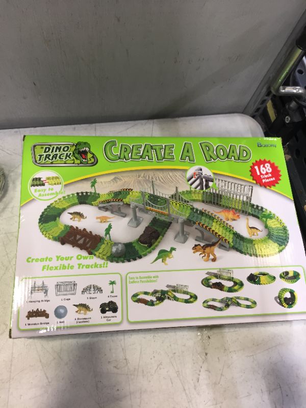 Photo 2 of Batlofty Dinosaur Toys Race Track, Flexible Track Playset, Create A Dinosaur World Road Race with 1 Dinosaur Car and 6 Dinosaur Toys for 3 4 5 6 7 Year Old Boys Girls Birthday Gifts
