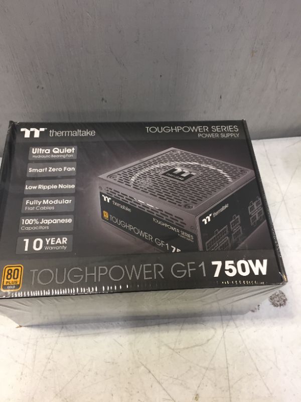 Photo 1 of Thermaltake Toughpower GF1 750W 80+ Gold SLI/ CrossFire Ready Ultra Quiet 140mm Hydraulic Bearing Smart Zero Fan Full Modular Power Supply 10 Year Warranty PS-TPD-0750FNFAGU-1 Black 750W GF1
