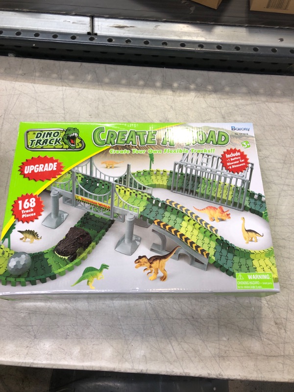 Photo 2 of Batlofty Dinosaur Toys Race Track, Flexible Track Playset, Create A Dinosaur World Road Race with 1 Dinosaur Car and 6 Dinosaur Toys for 3 4 5 6 7 Year Old Boys Girls Birthday Gifts
