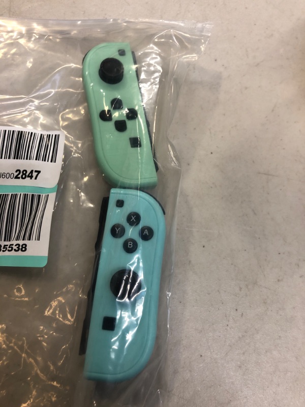 Photo 2 of Luckisix Joy Con (L/R) Controller Replacement for NS - Joy Pad Controllers for Nintendo Switch, Left and Right Controllers (Red/Blue) (Avocado Green/Sky Blue) ** USED UNABLE TO TEST 
